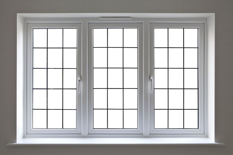 Modern home with large uPVC casement doors leading to a patio